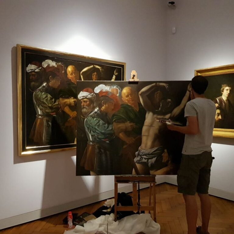 צייר מעתיק יצירה במוזיאון של ורשה